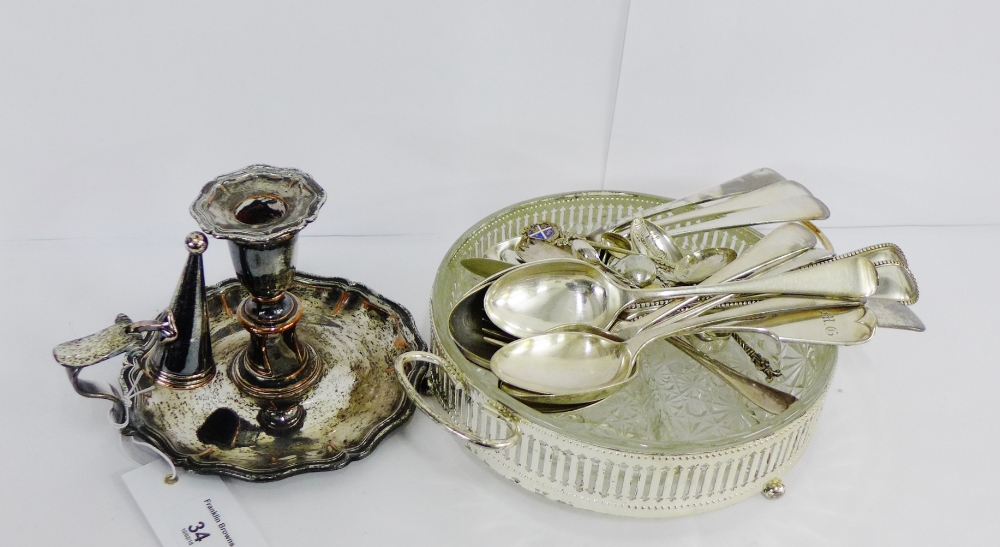 An Old Sheffield plate chamber candlestick and snuffer together with an Epns and glass serving