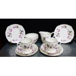A Duchess china tea set painted with rose sprays, comprising six cups, six saucers, six side plates,