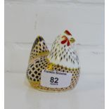 A Royal Crown Derby 'Imari' patterned porcelain paperweight of a 'Chicken', with a gold stopper, 8cm