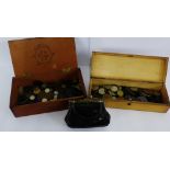 Two wooden boxes and a leather purse containing a quantity of UK & European pre decimal coins and