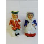 A pair of Punch and Judy Toby jugs, 24cm high, (2)