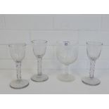 A large etched wine glass and three others, (4)
