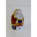 A Royal Crown Derby 'Imari' patterned porcelain paperweight of 'Father Christmas' with gold stopper,