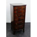 A mahogany veneered bow front chest with six graduating drawers , 110 x 46cm