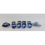 A collection of 19th century and later blue and white cups and saucers to include 'Willow' and '