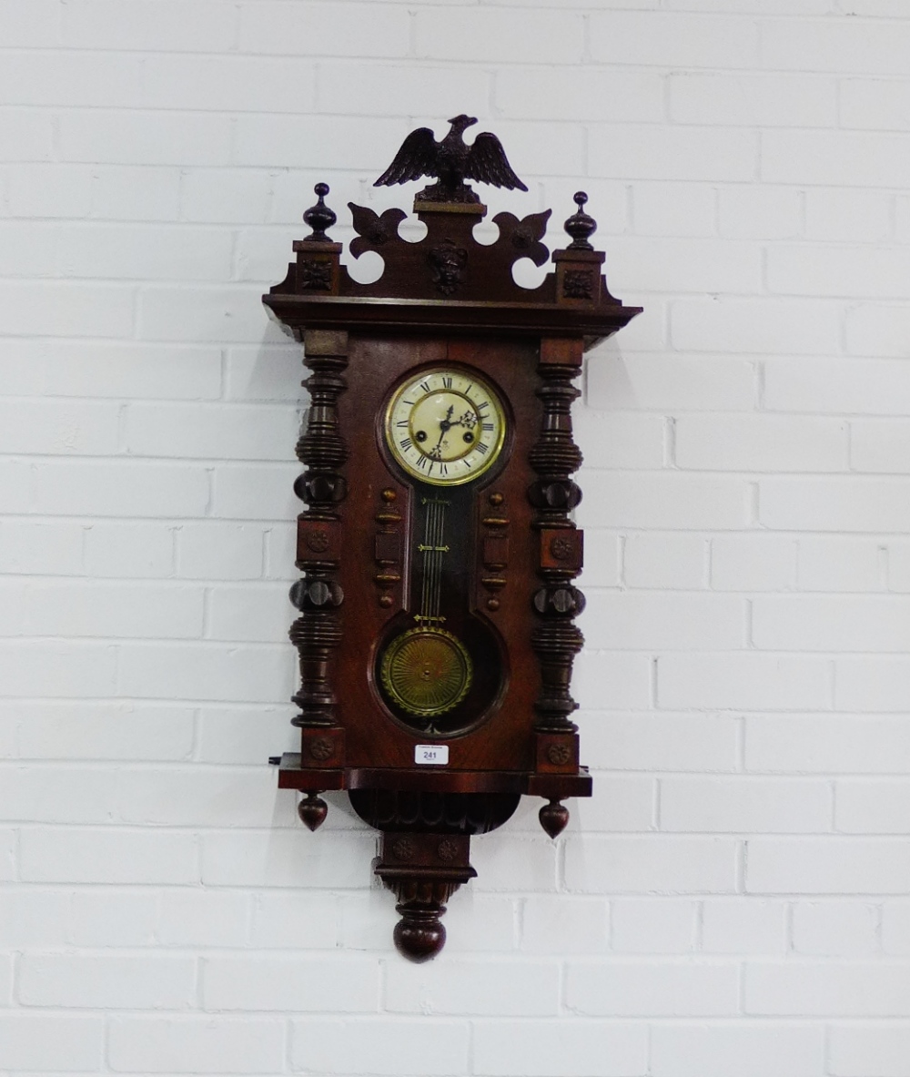 A Vienna cased mahogany wall clock