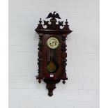 A Vienna cased mahogany wall clock