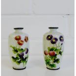 A pair of miniature Ginbari enamel vases with mixed flower pattern to a white ground, 9cm high, (2)