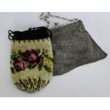An early 20th century mesh chain purse / handbag with silver frame and handle 17cm wide together