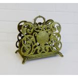 A brass letter rack, 21cm wide