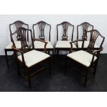 A set of six mahogany pierced splat back chairs with upholstered seats, comprising four dining and
