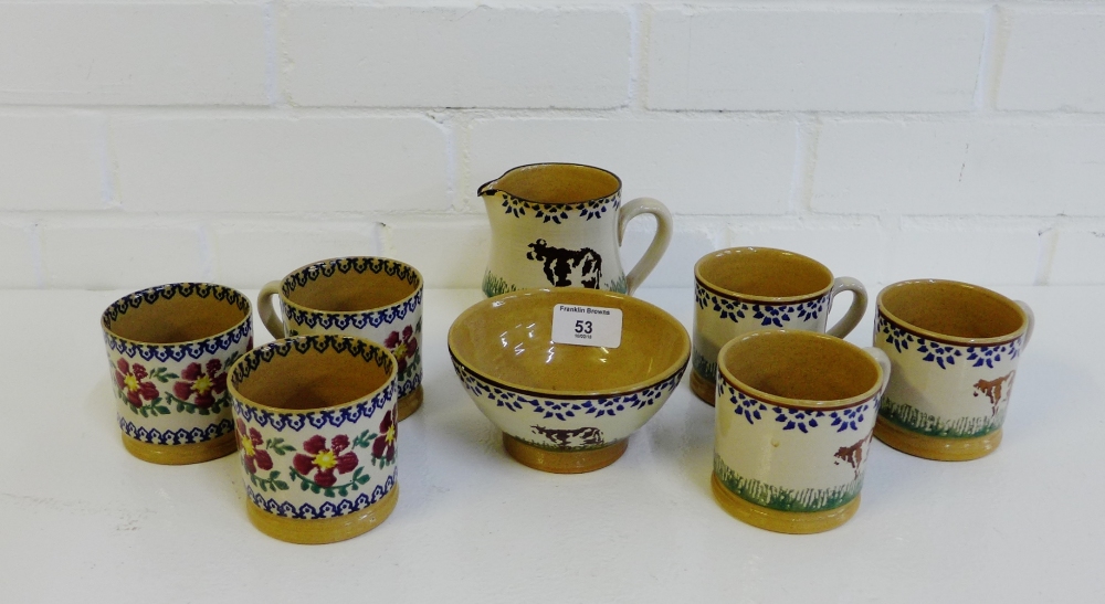 A collection of Nicholas Mosse pottery to include six cups, a milk jug and a sugar bowl, (8)