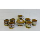 A collection of Nicholas Mosse pottery to include six cups, a milk jug and a sugar bowl, (8)