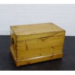 A pine storage trunk, with iron handles to side and plinth base, 50 x 80cm