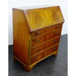 A modern bureau, the fall front over pullout slides and four long drawers,