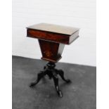 A mahogany work / sewing table, the rectangular lift up top with a lined interior, above an inlaid