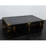 A vintage brass bound storage trunk, 35 x 102cm