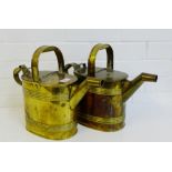 A pair of Victorian brass watering cans, 30cm high, (2)