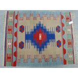 A flat weave Kilim style mat, 90 x 120cm