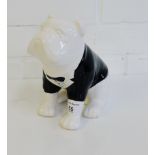 A contemporary black and white glazed Bulldog money bank, 19cm high