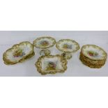 A Doulton Burslem blush ivory floral patterned dessert service comprising eight plates, five serving