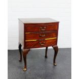 A small mahogany veneered bow front cabinet, 64 x 48cm