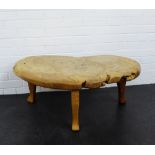 A burr wood table on triple cabriole legs