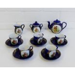 A child's continental porcelain teaset comprising five cups, five saucers, teapot, twin handled
