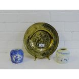 A Chinese circular brass plate, 25cm, with Dragon pattern, together with two blue and white ginger