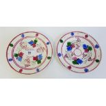 A pair of 19th century Dilwyn, Swansea pearlware nursery plates with underglaze coloured vine leaf