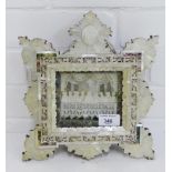A late 19th early 20th century large framed mother-of-pearl and Abalone shell carved and panelled '