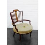 A mahogany and inlaid open armchair with spindle back and upholstered seat, on square tapering