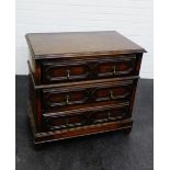 An oak Jacobean style chest, the rectangular top over two short and two long drawers, 73 x 76cm