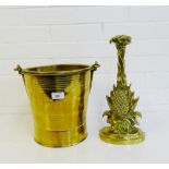 A brass pineapple doorstop and a brass champagne bucket (2)