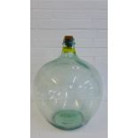 A clear glass carboy, approx 50cm high