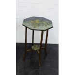 A painted octagonal topped drop leaf table, with cross stretcher, on out swept legs, 68 x 44cm