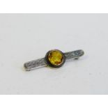 Scottish silver and citrine brooch with Celtic knotwork pattern, 5cm wide