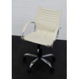 A cream leather and aluminum swivel armchair, 101 x 56cm