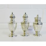 A pair of Edwardian Birmingham silver pepper pots and a Victorian London silver pepper pot (3)