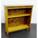 An oak bookcase, the rectangular above a Greek Key frieze, raised on bracket feet, 94 x 92cm