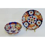 An 'Imari' patterned scalloped bowl and plate, each typically painted with flowers and stylised