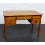 An early 20th century oak school desk designed by Peter Waals and likely constructed by students