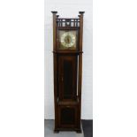 An early 20th century electric clock designed by R.G. Wilson, 1909, contained within an Arts &