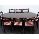 A Meredew twin pedestal dining table and eight chairs, to include two carver chairs, 73 x 195cm, (9)