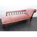 An oak upholstered chaise longue with spindle back, 70 x 180cm