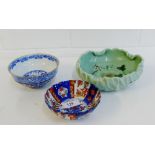 A small Chinese blue and white 'Imari' bowl, a celadon glazed bowl and a blue and white Japanese