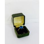 A 9 carat gold blue gemset dress ring, UK size P