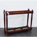 A stained country wood stick stand, with drip trays 72 x 86cm From the residual contents of a West