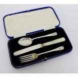 Sheffield silver three piece cutlery set comprising mother of pearl handled knife, fork and spoon