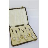 An Art Deco cased set of six silver and black and white enamel teaspoons with makers mark for